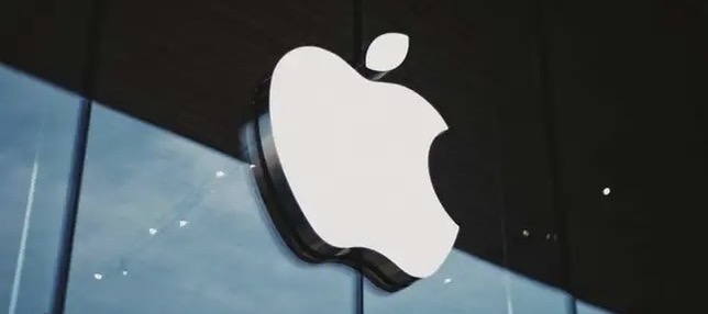 Apple logo on a glass building