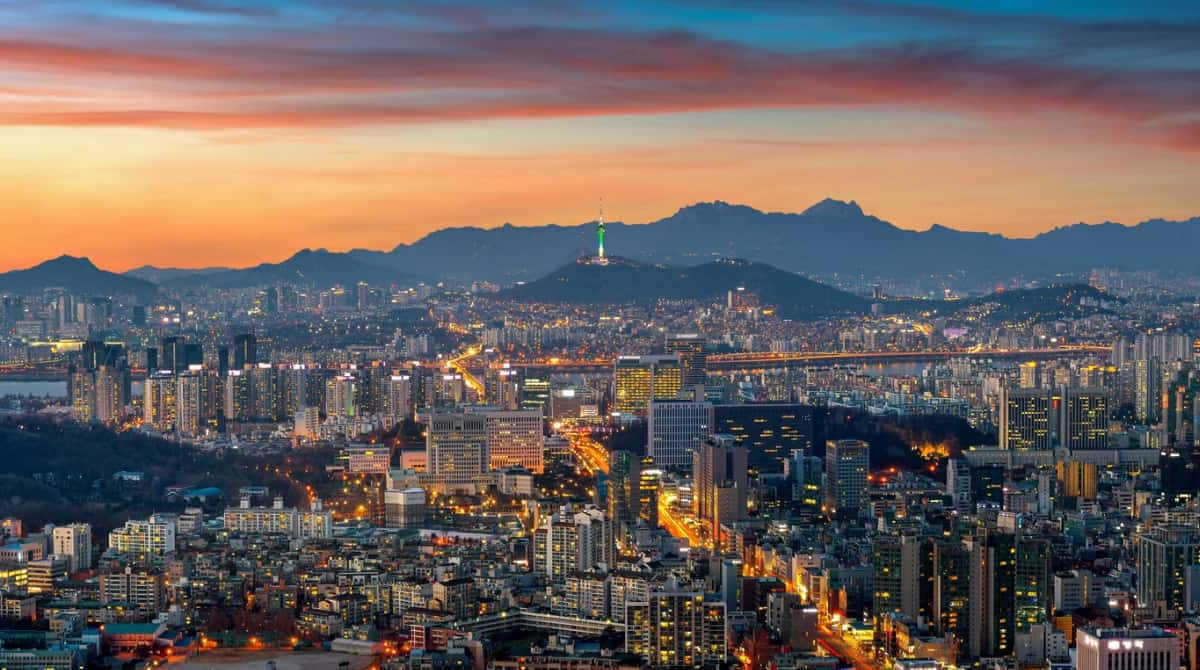 Twilight descends on Seoul's cityscape with Namsan Tower aglow